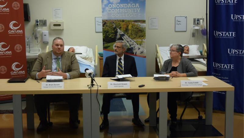 Photo of three SUNY Presidents participating in Nursing signing ceremony