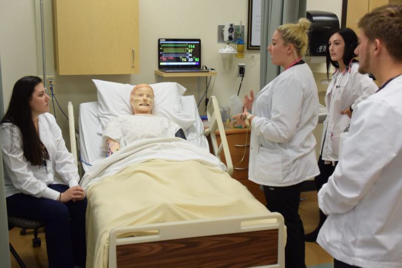 Students work in SIM Lab in Nursing