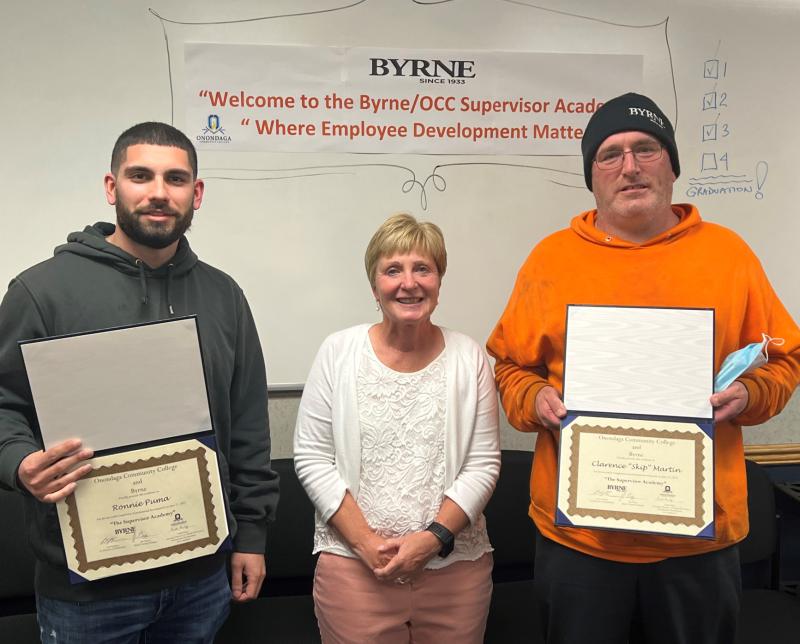 Ronnie Puma (left) and Skip Martin (right) are the first Byrne Dairy employees to complete the Supervisor Academy. They are pictured with OCC's Enid Reiley (center).