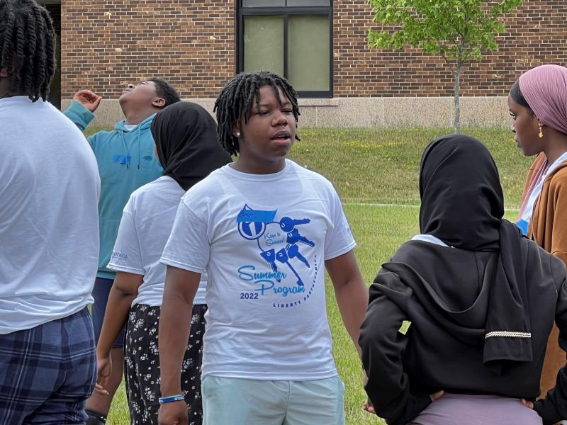 Imere Kemp speaks with fellow students during Liberty Partnerships' summer program on the Onondaga Community College campus.