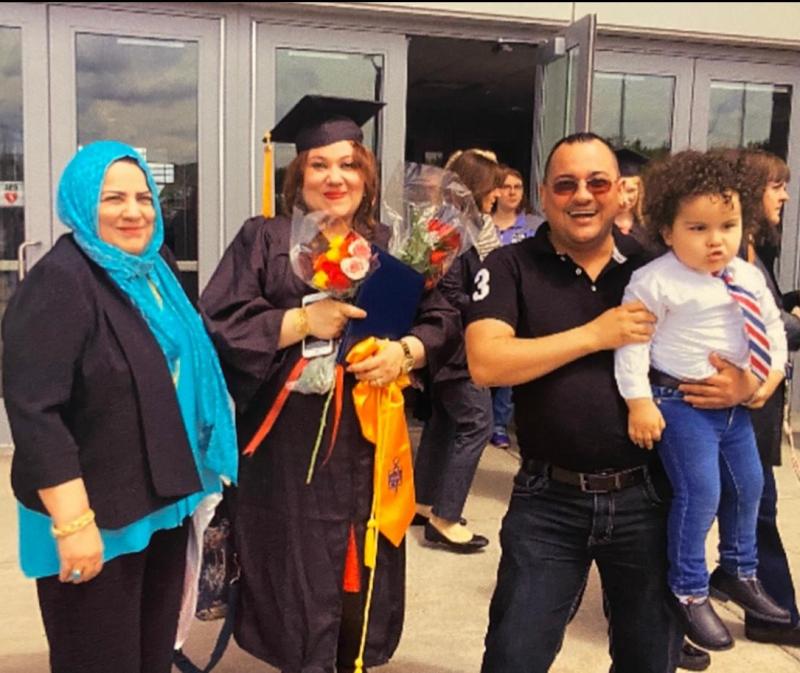 Wurood Shaher is pictured outside SRC Arena on her graduation day in 2016. Also pictured (left to right) are her mother-in-law Nihad Abd, her husband Mohanad Faisal, and their son Sayf who is now a high school senior.
