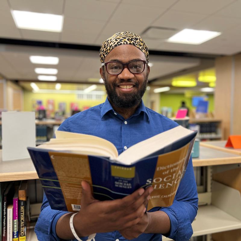 Tevin Martin is majoring in Human Services and Humanities &amp; Social Sciences. He's pictured in Coulter Library.