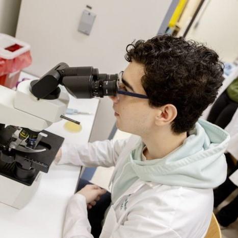 OCC Mathematics &amp; Science major Carlos Rodriguez-Bornot is pictured doing research at SUNY Binghamton.