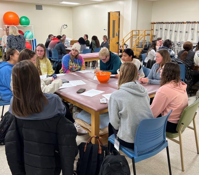 Students from OCC's Physical Therapist Assistant program and Doctor of Physical Therapy students from SUNY Upstate Medical University spent time together collaborating on problem-solving. They are pictured in OCC's Ferrante Hall.