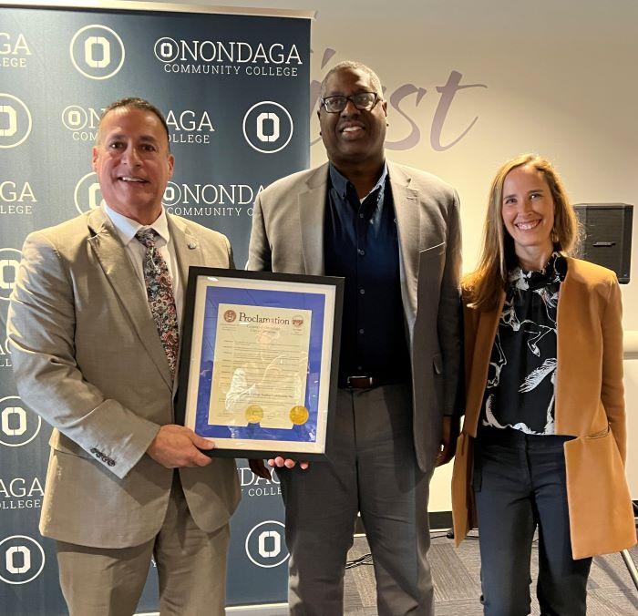 Leading OCC's First-Generation College Celebration are (left to right) Onondaga County Deputy of Strategic Initiatives Esteban Gonzalez, OCC President Dr. Warren Hilton, and OCC's Director of Student Support Services Dr. Meghan Bahns.