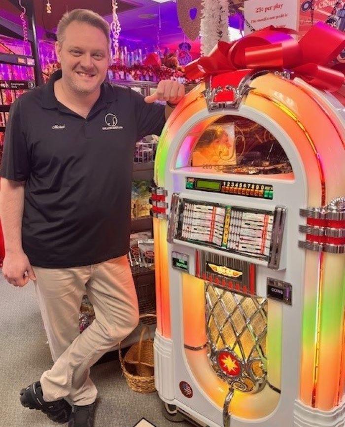 Michael Speach '02 filled a jukebox with hit records from his collection, and set it up in The Speach Family Candy Shoppe. Customers can play songs for a quarter, with the money going to local organizations.