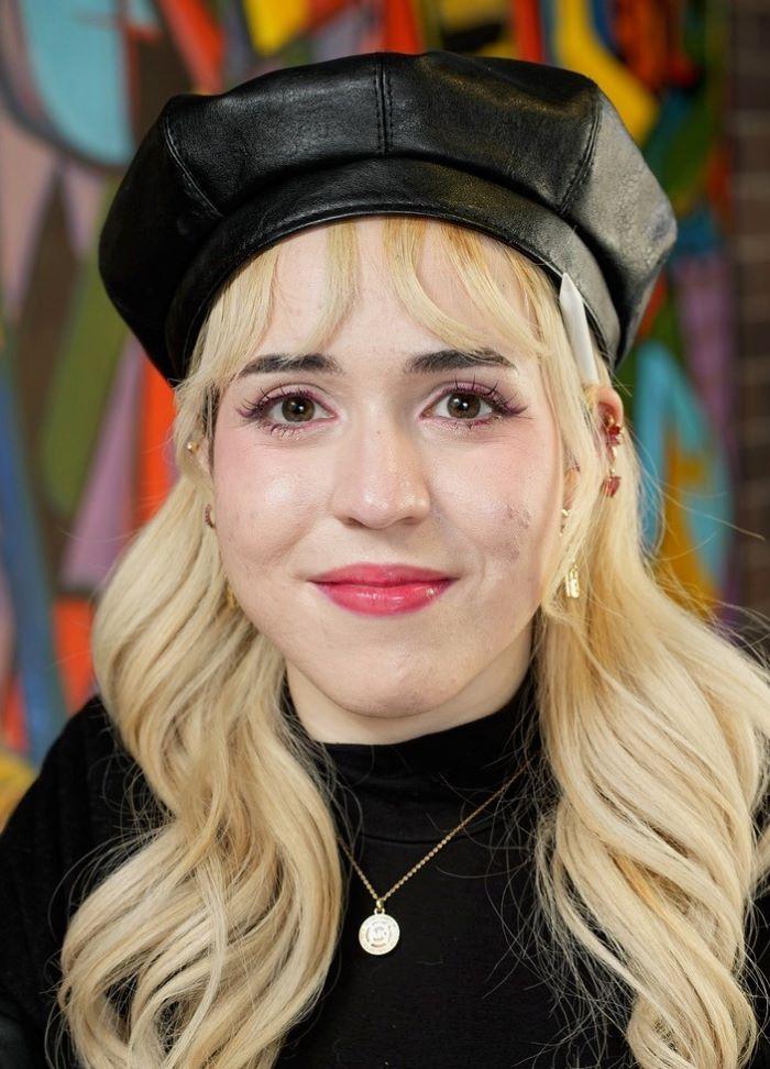 Abi Marin is a member of Student Government and an Art major specializing in Graphic Design.