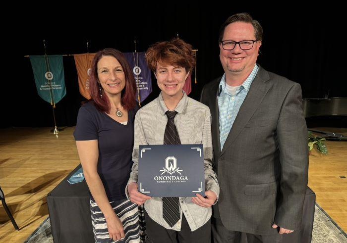 Lou Kaminski (center) was one of the more than two dozen students recognized during the Curriculum Honors ceremony. His parents Kelly (left) and Mike(right) Kaminski are both OCC Alumni and Professors.