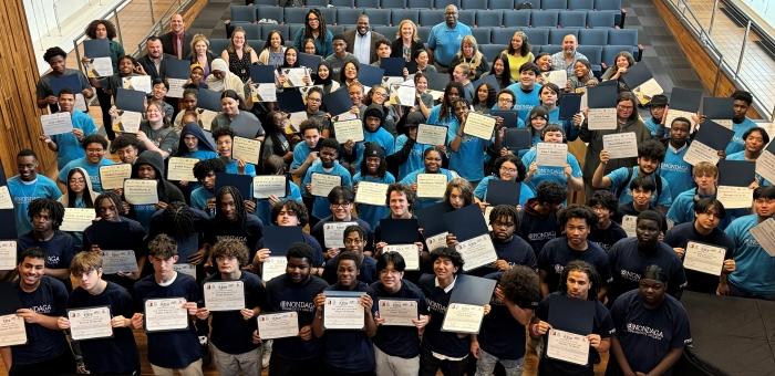 Syracuse City School District students pose for a group photo at a P-TECH Signing ceremony on the Onondaga Community College campus.