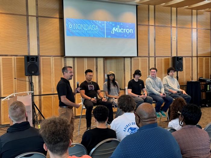 Professor Mike Grieb (standing on left) led a Micron internship panel discussion with students (left to right) RJ Tinsley, Allison Wilcox, Aiden Knapp, Will Appleton, and Sam Pandossi.