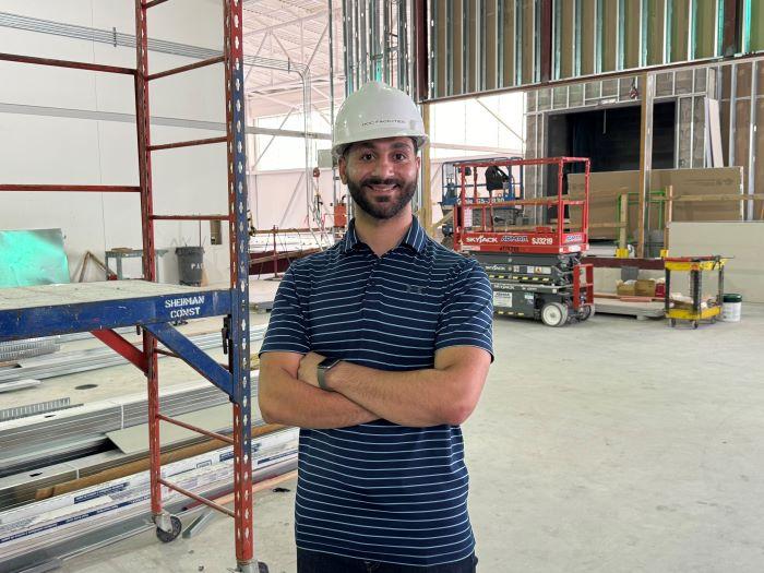 Odae Badwan '17 has returned to Onondaga Community College as a Facilities Project Manager. He's pictured in the new 2nd floor of the Whitney Applied Technology Center where the Micron Cleanroom Simulation Lab will be constructed.