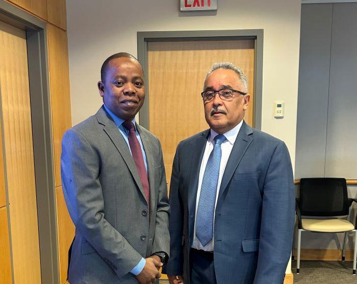 Haji Adan '12 (left) was sworn-in as a member of OCC's Board of Trustees by Vice-chair Jaime Alicea.