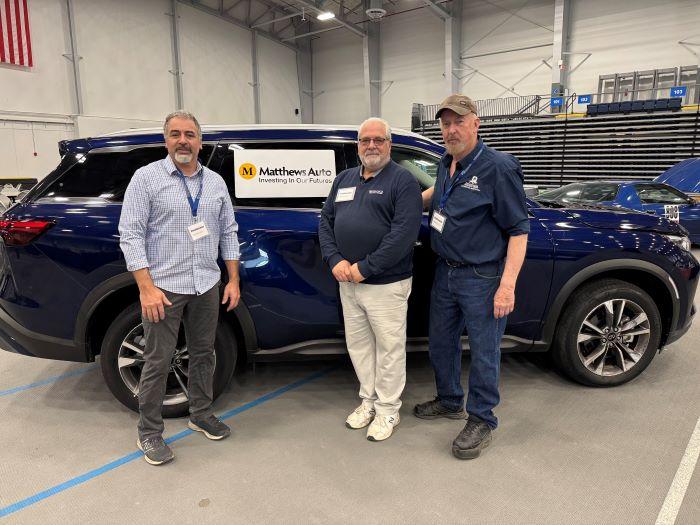 This 2025 Infiniti QX60 will give OCC Auto Tech Professors (left to right) Jon Seargant, John Bruno, and Mark Ellis a state-of-the-art teaching tool. The vehicle was displayed in the SRC Arena April 25 &amp; 26 during spring Open House.