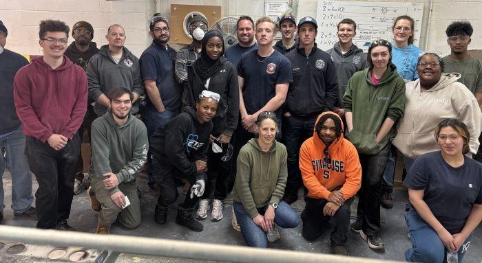 Students, faculty, and staff in the School of Technology, Engineering &amp; Computing participated in community service, building beds for children.