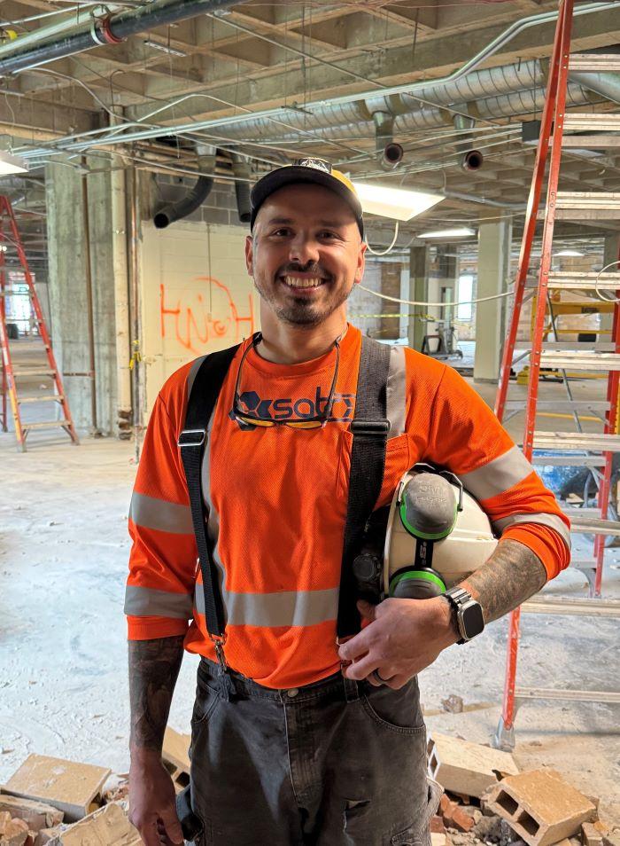 Nick Kolbasook is a 31-year-old Electromechanical Technology major at Onondaga Community College. This summer he's working on the demolition of the first floor of Ferrante Hall.