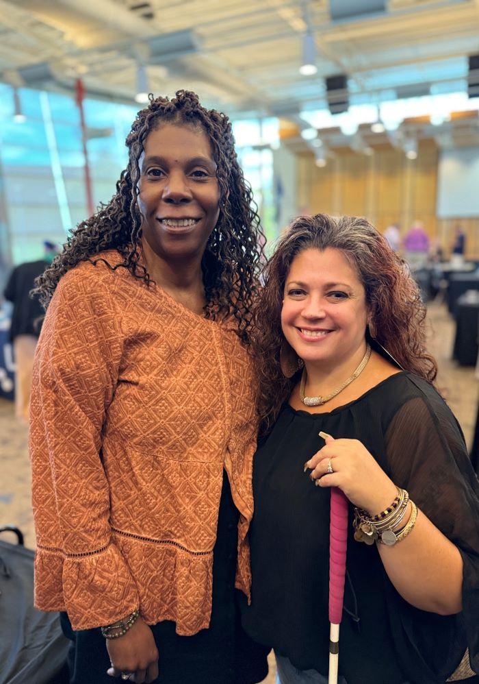 Alumna Dawn Penson '20 (right) brought a resource fair for the blind and visually impaired to campus last week. She's pictured with Daneen Brooks (left) of OCC's Office of Accessibility Resources.