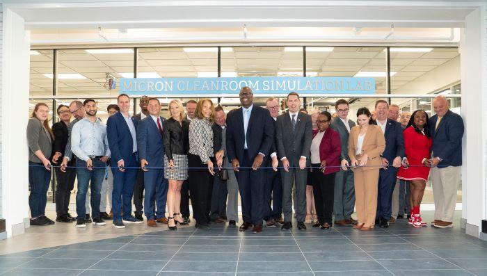 A wire cutting ceremony was held outside the Micron Cleanroom Simulation Lab on the second floor of the Whitney Applied Technology Center.