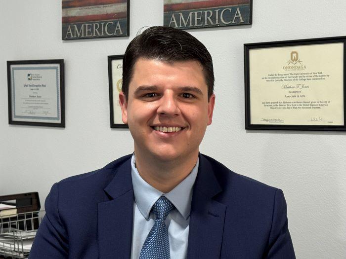 Matt Jones '14 proudly displays his OCC degree on the wall of his office where he works as the Director of Communications for Assemblymember Pam Hunter. &quot;OCC was a lifeline that made everything else possible for me.&quot;