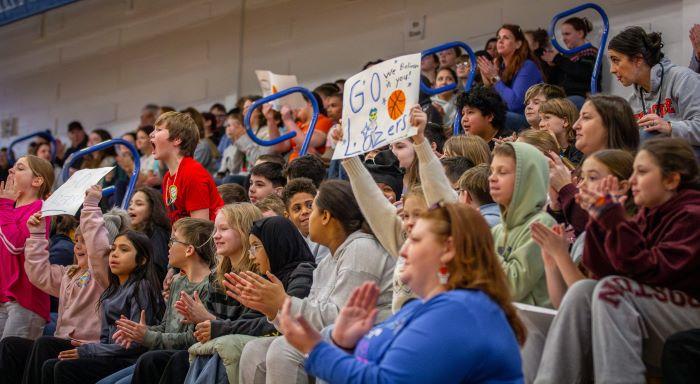 Students, staff, and teachers from the Onondaga Central School District enjoy watching the OCC Women's Basketball team as part of Education Day events on campus.