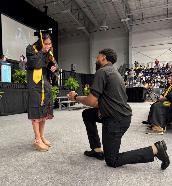 Shaun Barfield (right) proposed to Bellanina Viggiano (left) at commencement.