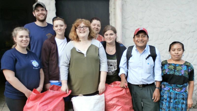 During their most recent service learning trip nursing students bring large bags of health supplies for residents in Guatemala. Left to right: Samantha Darling, Hans Stumpf, Erica Moeller, Assistant Professor Lee Berg, Diana Froats, Jamie Hamilton and Guatemala Health Promoters Vicente and Olivia.