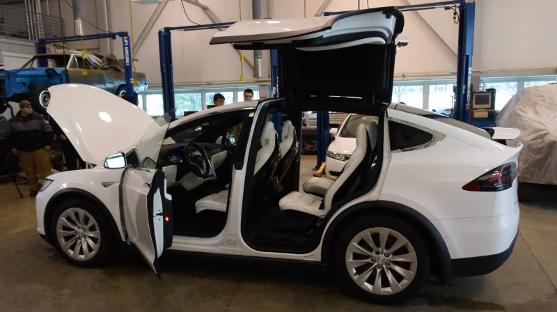 A Tesla Model X was brought into the Automotive Technology lab for the announcement of a Tesla job training program at OCC.
