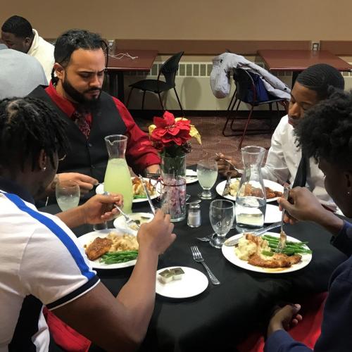 Students participating in the Extraordinary Men of Distinction “Dining Etiquette Program” 