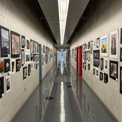 Award-winning work from the Scholastic Art Show lines the halls of the Whitney Applied Technology Center.