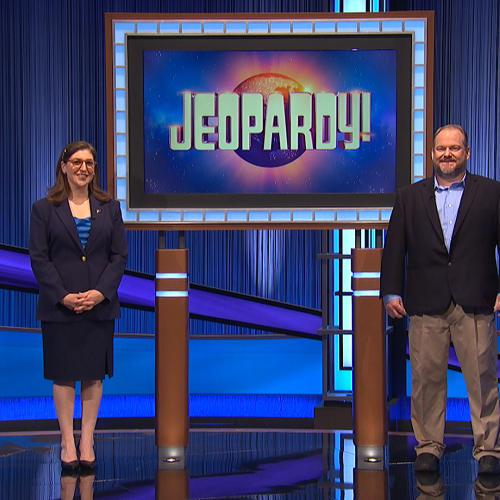OCC Philosophy Professor David Bzdak (right) will appear on the television show "Jeopardy" later this month. He's pictured with show host Mayim Bialik (left).