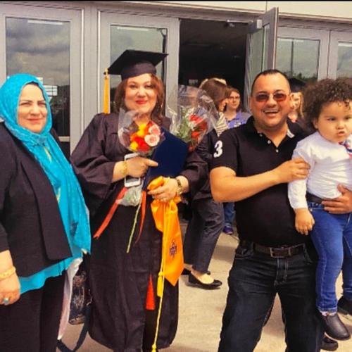 Wurood Shaher is pictured outside SRC Arena on her graduation day in 2016. Also pictured (left to right) are her mother-in-law Nihad Faisal, her husband Mohanad Faisal, and their son Awt who is now a high school senior.