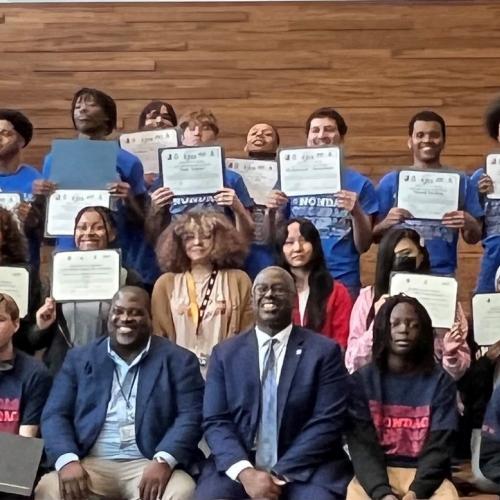 Syracuse City School District students and supporters of the P-TECH program pose for a group photo at Onondaga Community College.