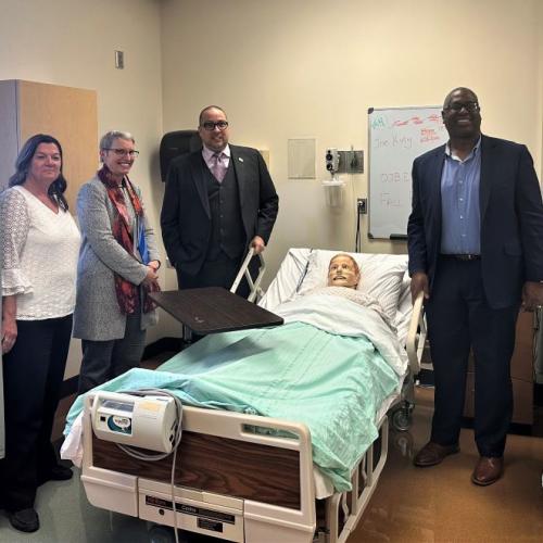 Touring OCC's simulated patient lab in Ferrante Hall are (left to right) OCC Dean Dr. Karen Fabrizio, State Senator Rachel May, State Senator Gustavo Rivera, and OCC President Dr. Warren Hilton.