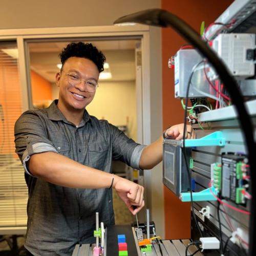 Robert "RJ" Tinsley is in OCC's new Micron-related Electromechanical Technology degree program. He's been selected for a paid internship at Micron in Boise, Idaho. He's pictured in OCC's Electromechanical Lab in the Whitney Applied Technology Center.