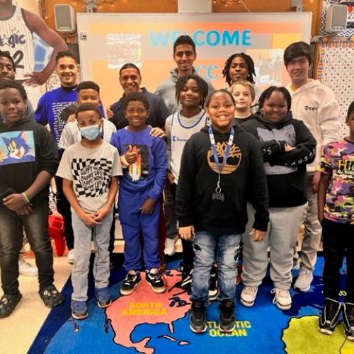Bringing the students together are (back row left to right) Isiah Duggar and Cameron Littlejohn '15 of Meachem Elementary, and OCC's Shayne Turo '23, Jaedin Roget-Feimster, Mustafa Alnuaimi, and Sharif Jafari.
