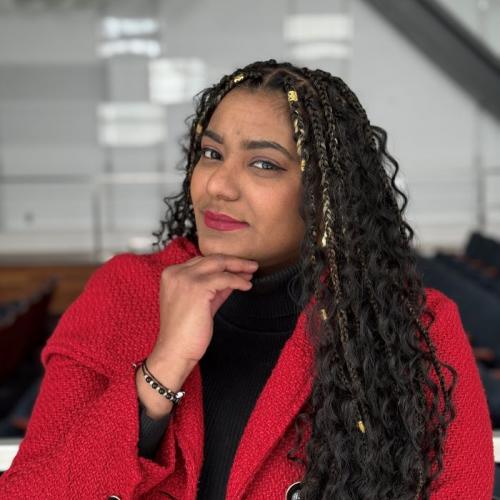 Mirianny Tifa Paulino is a native of the Dominican Republic who is majoring in Music with a specialization in Voice. She's pictured in OCC's Recital Hall.