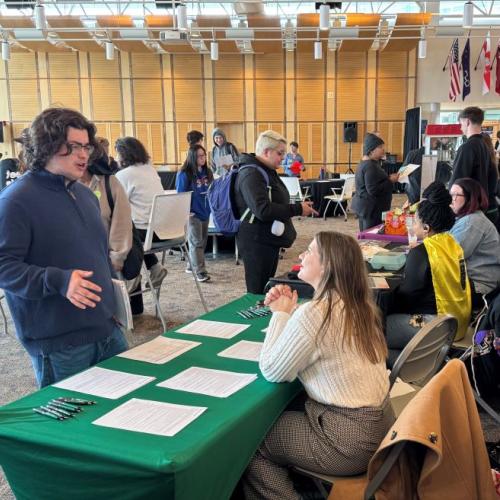Students speak with employers during Onondaga Community College's first of three Career Showcases.