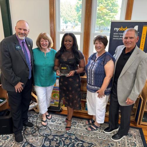 Presenting the Community Impact Business of the Year Award at Birchtree Montessori (left to right): Bob Griffin, SBDC; Karyn Dieffenderfer, Birchtree Montessori; Sonya Smith, SBDC; Rosemary Morgese, Birchtree Montessori; Mark Pitonzo, SBDC.