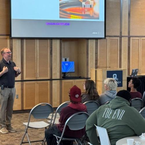 Micron's Mike Guttman speaks with students about paid summer internship opportunities. Approximately 65 students attended the information session.