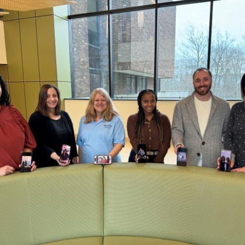 Members of the OCC community showing pictures of their twins are (left to right): Dana Acee, Nicole Schlater, Dana Marzynski, Najier Johnson, David Furney, and Leslie Reid.