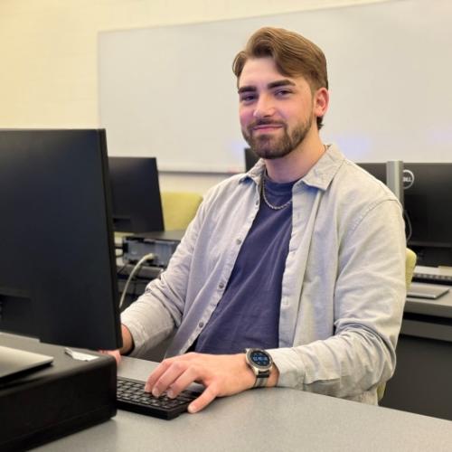 Carter Menikheim is a 26-year-old student in the Computer Information Systems degree program. He's attending OCC tuition-free thanks to the SUNY Reconnect program.