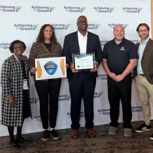 Accepting OCC's designation as an Achieving The Dream Leader College are (left to right) Agatha Awuah, Naomi Stewart, Warren Hilton, Ted Mathews, and Matt DelConte.