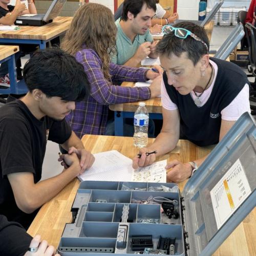 Professor Colleen Stevens (right) teaches Electromechanical Technology and Math at Onondaga Community College.