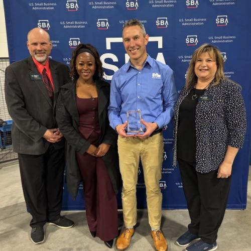The "Exporter of the Year" Award was presented during National Small Business Week. Pictured (left to right) are Bob Griffin, Sonya Smith, Nate Andrews of Morse Manufacturing, and Kellie Greene.