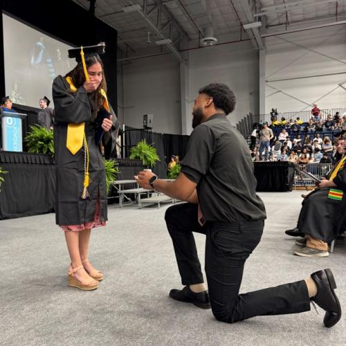 Shaun Barfield (right) proposed to Bellanina Viggiano (left) at commencement.