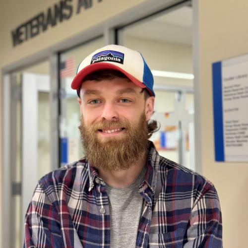 Eric Kreisler is a 33-year-old Student Veteran who will complete his Electrical Technology degree this semester. He's pictured outside OCC's Office of Veterans and Military Services on the second floor of Coulter Hall.