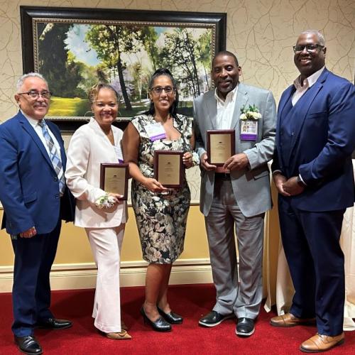 Pictured at the New York Community College Trustees awards are (left to right) OCC Board Chair Jaime Alicea, honoree Melanie Littlejohn, honoree Karinda Shanes '98, honoree Sam Rowser '86, and OCC President Dr. Warren Hilton.