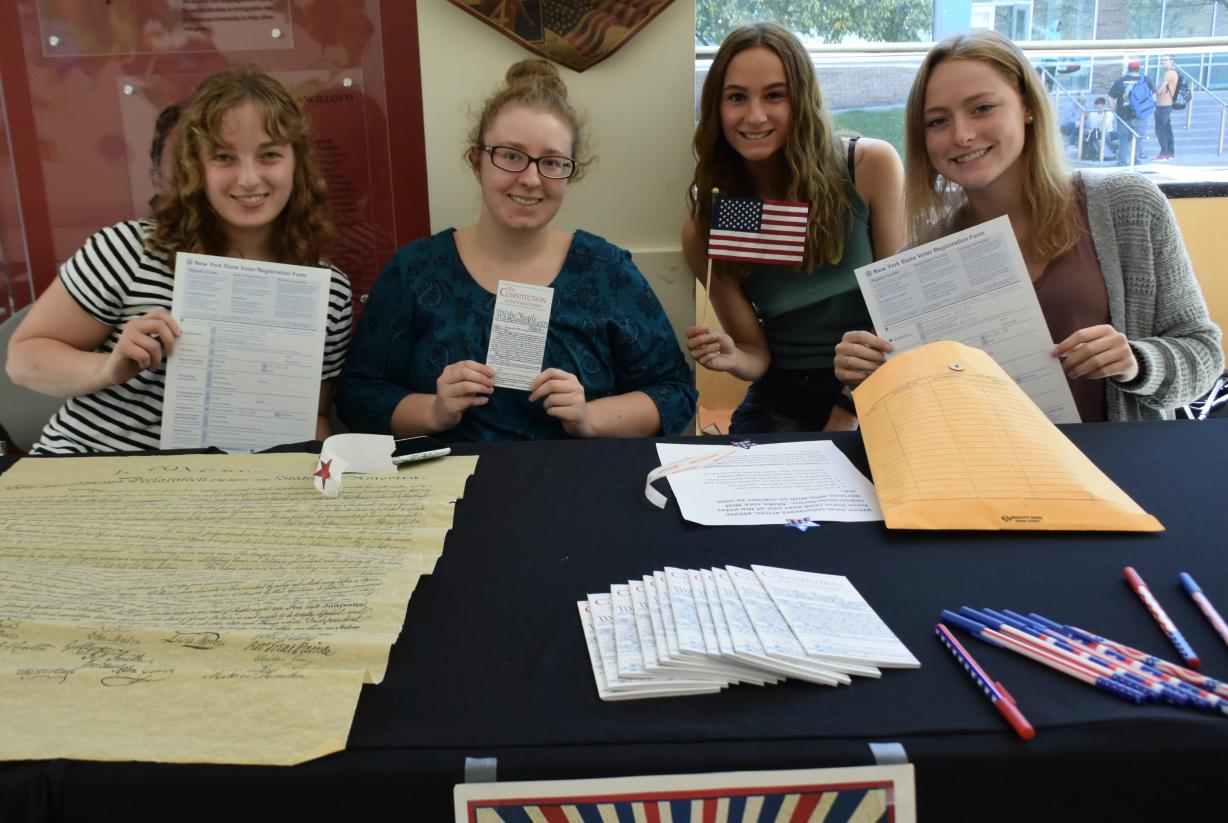 Phot of OCC students at Constitution Day table. Photo of OCC students at Constitution Day table.