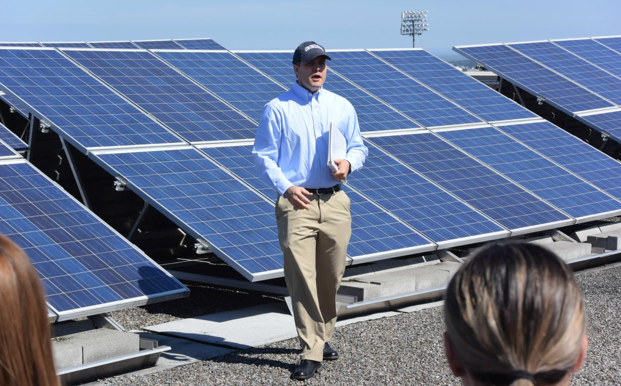 Dr. Sean Vormwald on the roof of the Whitney Applied Technology Center Dr. Sean Vormwald with students on the roof of the Whitney Applied Technology Center