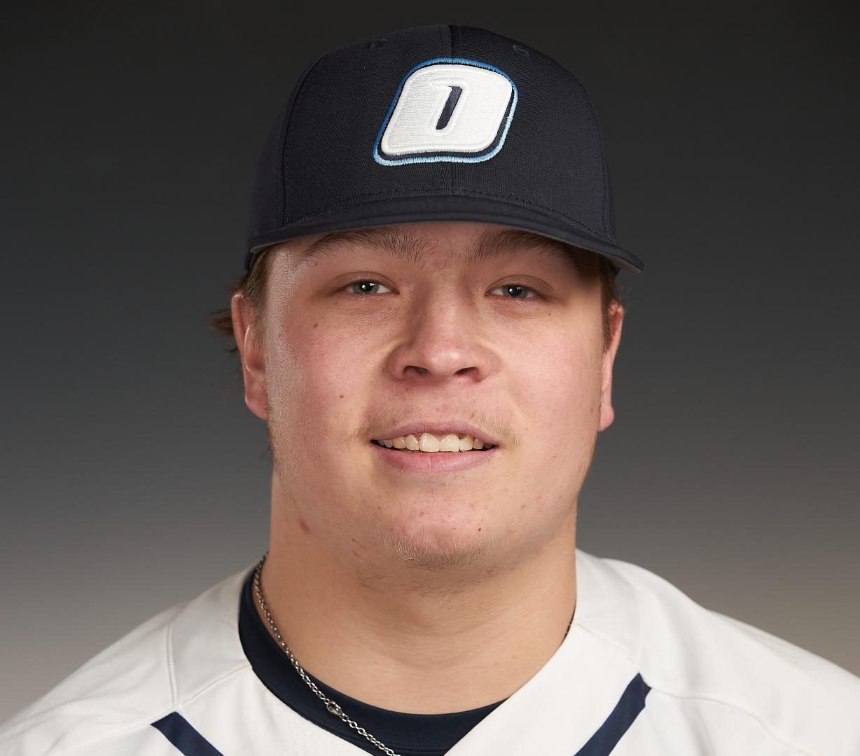 Kyler Majka with a Hat the Contains on OCC Branded "O"