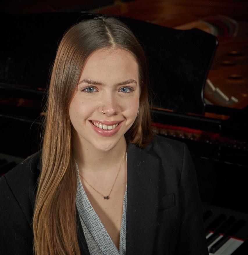 Hadassah Johnson is pursuing a Music degree at OCC. She's an officer in honor society Phi Theta Kappa and is one of the College's two All-State students. She's pictured in the Recital Hall in the Academic II building. Hadassah Johnson is pursuing a Music degree at OCC. She's an officer in honor society Phi Theta Kappa and is one of the College's two All-State students. She's pictured in the Recital Hall in the Academic II building.